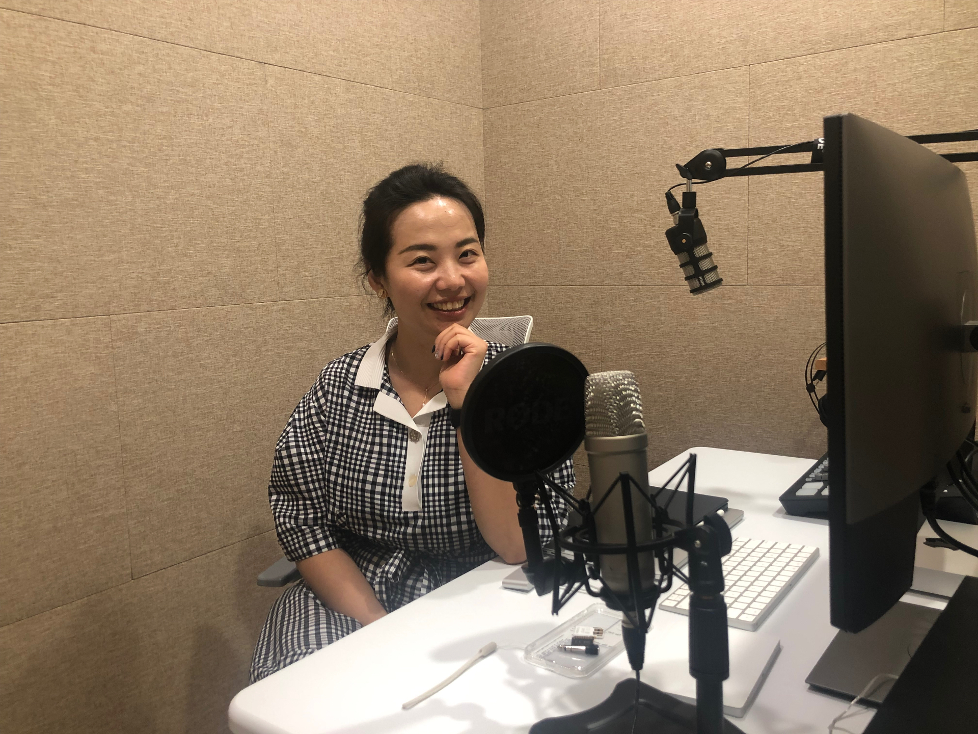 Yi Yang recording a coaching conversation in studio