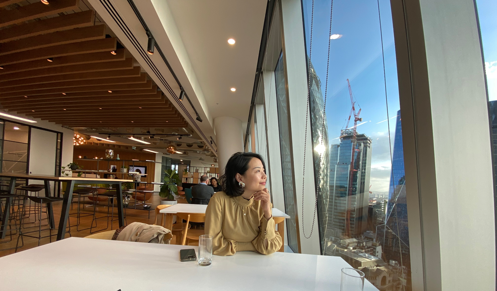 Yi Yang overlooking the City of London skyline